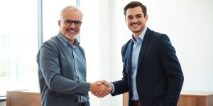 Man shakes hands, business deal.